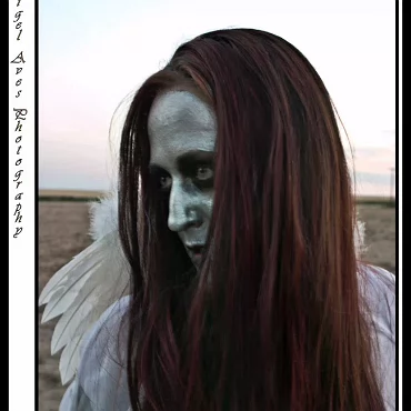 Dark Angel - Monica This was a test shoot we quickly put together. The strange thing was, we where in the middle of no-where, in an un-used field and we where thrown